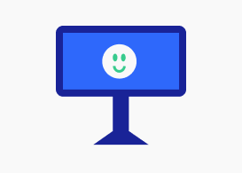 Monitor displaying happy face
